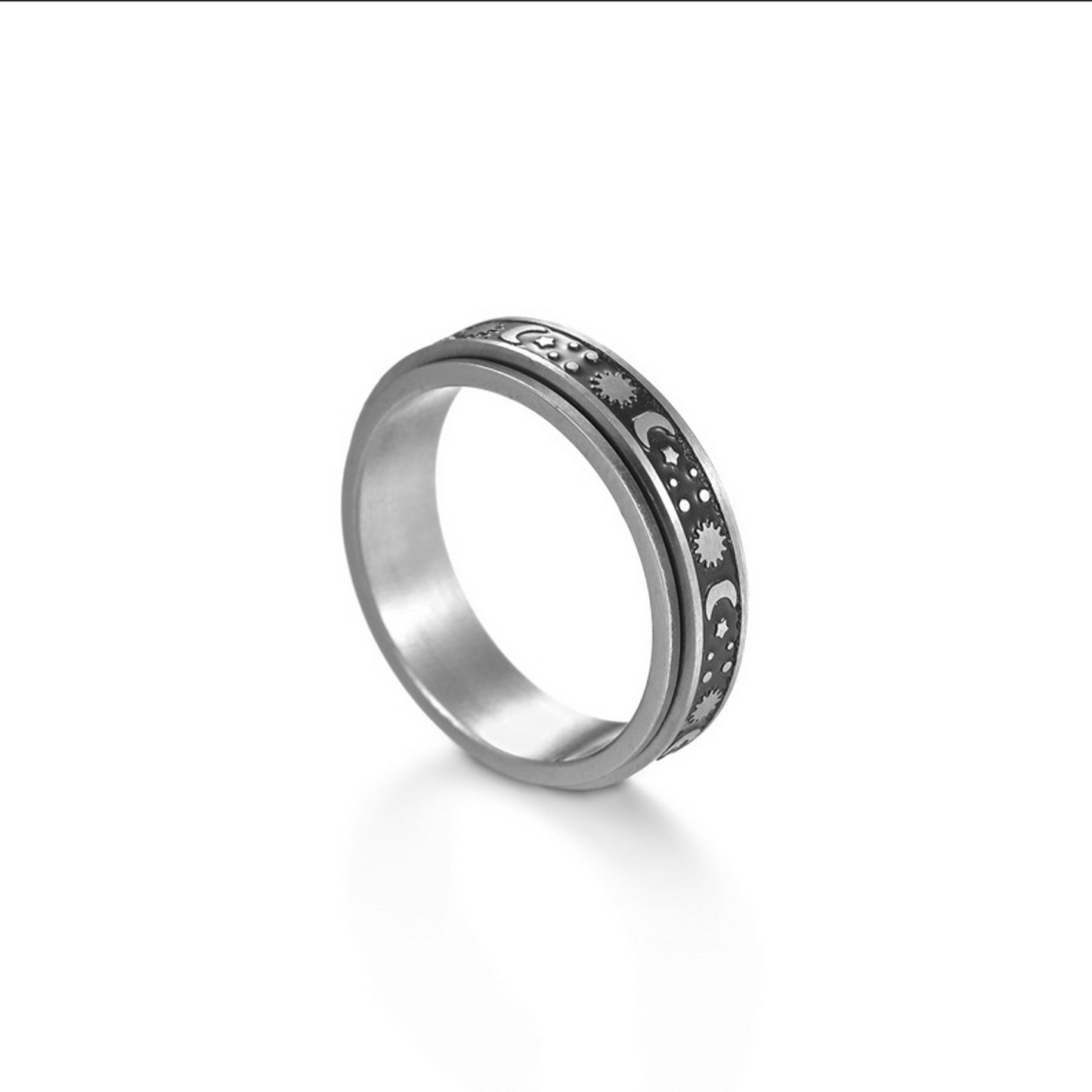 Thin silver outer band, the outer spinning part of the ring has a black background with silver moons, stars, and suns across the ring